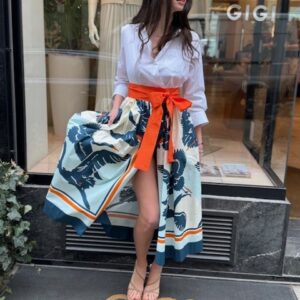 Sara Roka Kleid mit Palmenprint und orangefarbenem Taillengürtel